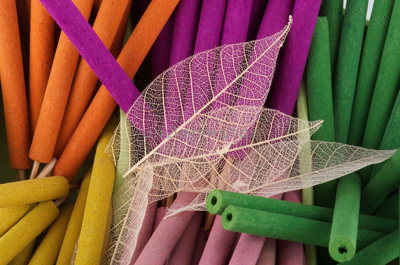Background of multi-colored aromatherapy sticks