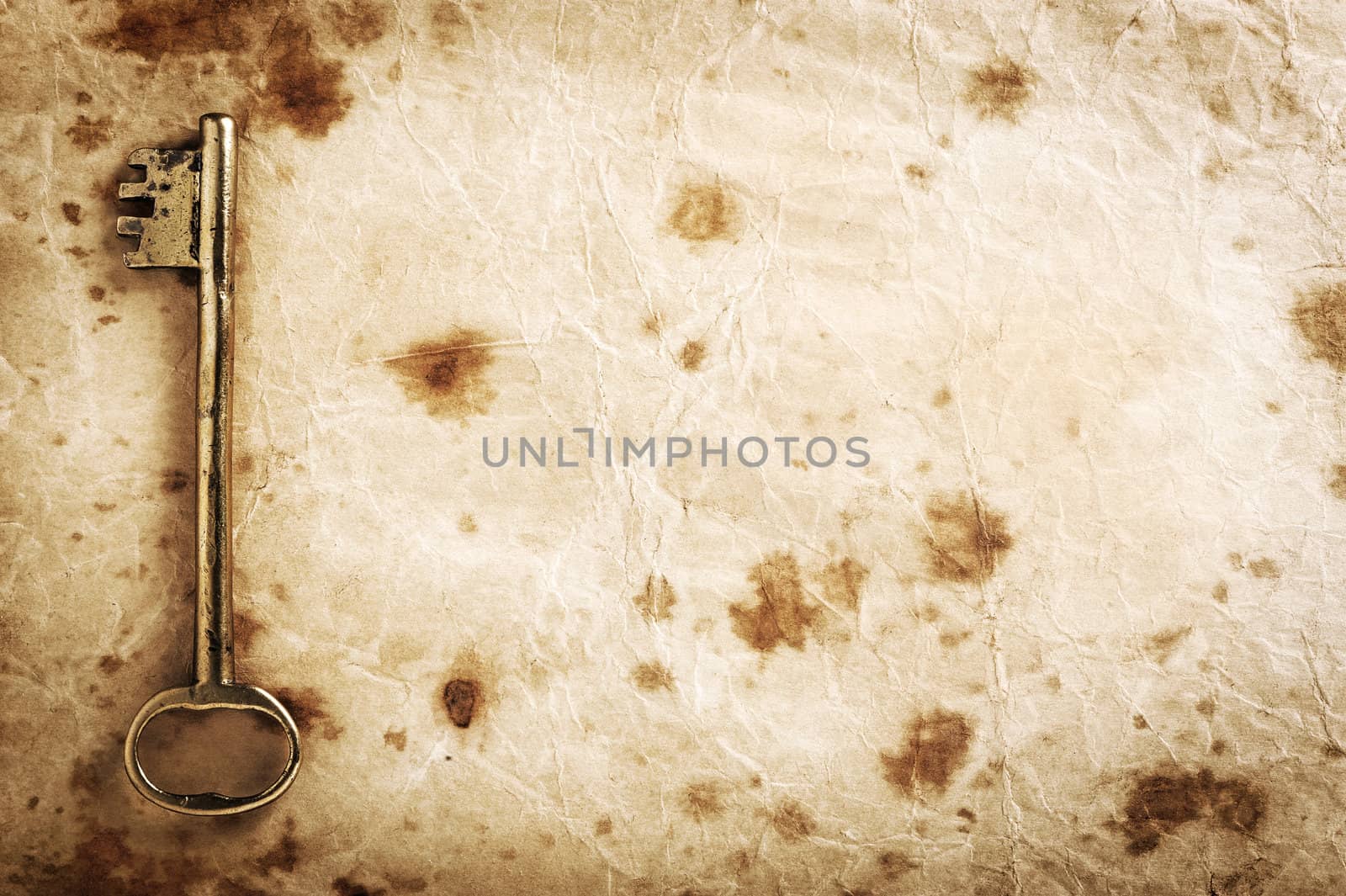 grunge paper background texture with old key