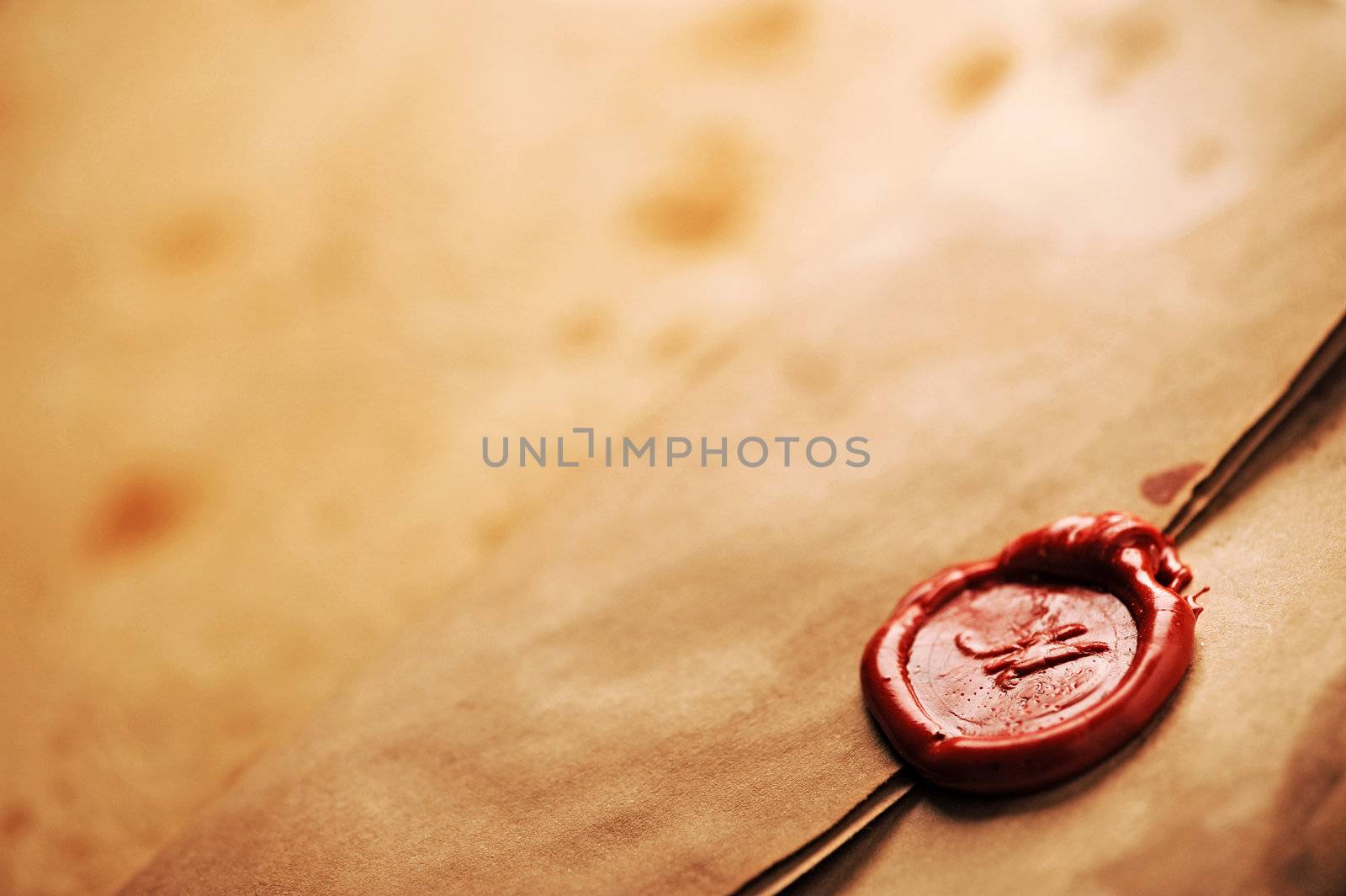 wax seal on a grunge paper, copy space