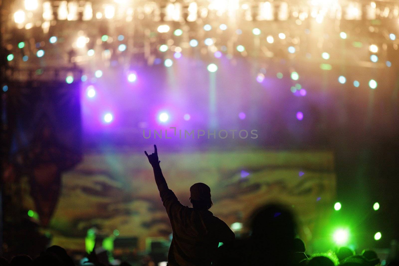 people celebrating on an open air shillouettes