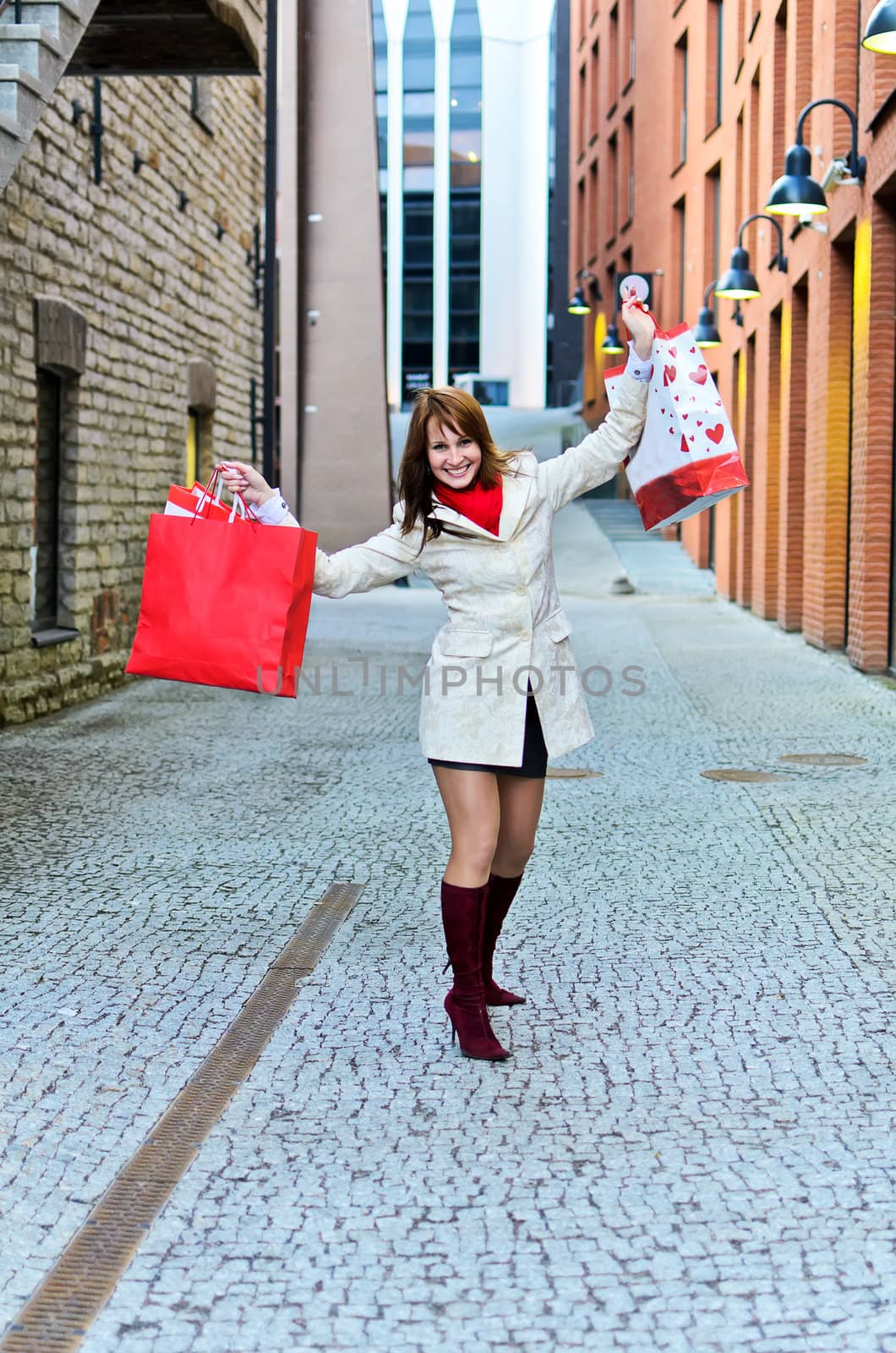 Portrait of pretty girl with shopping bags