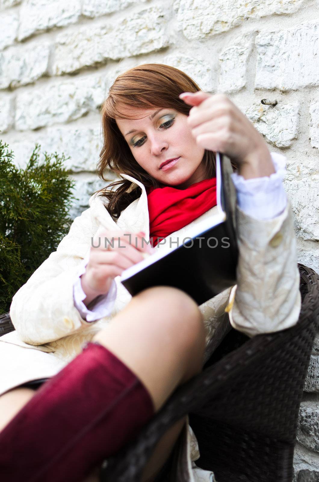 Portrait of pretty girl in street cafe