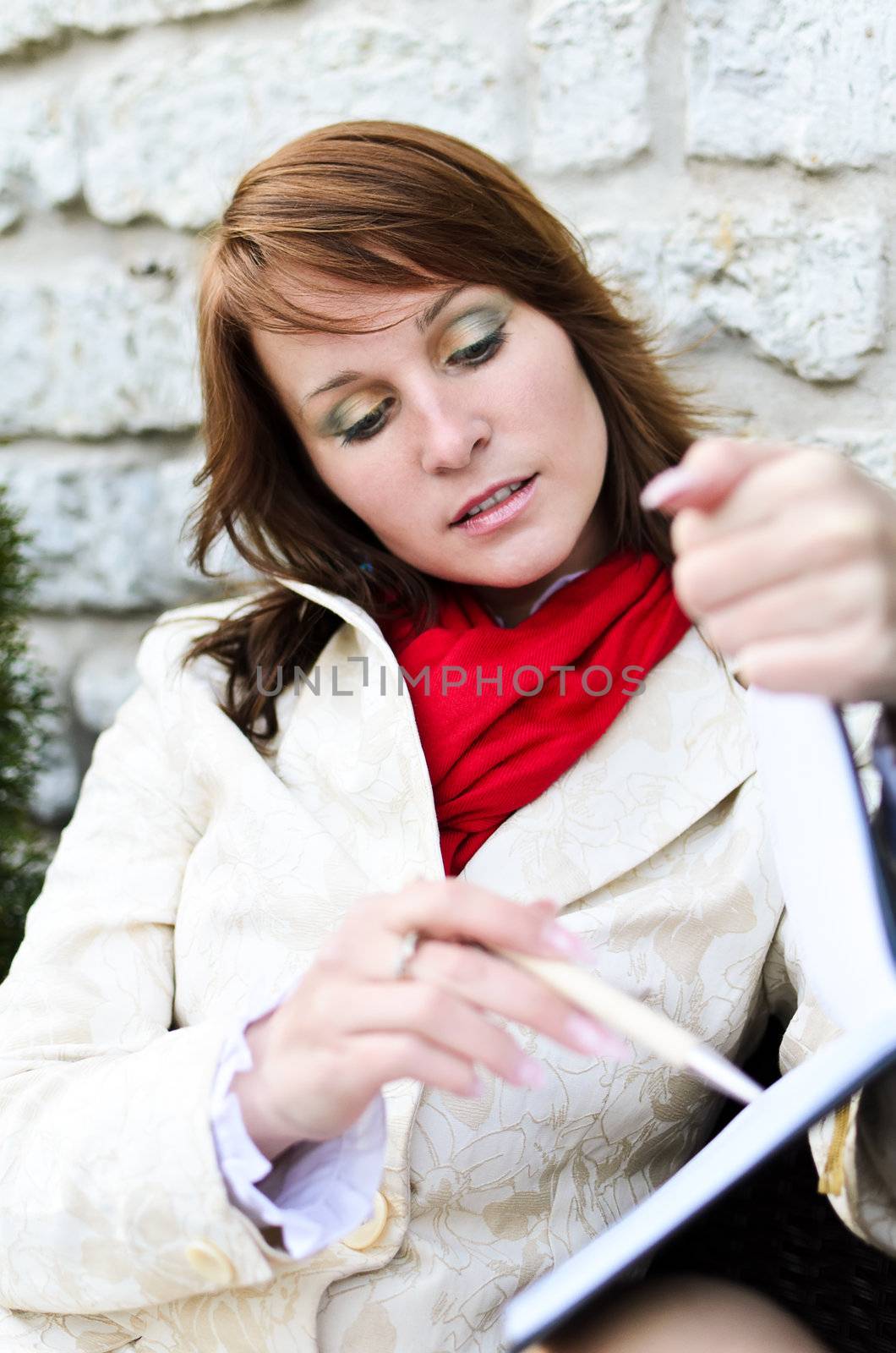 Portrait of pretty girl in street cafe