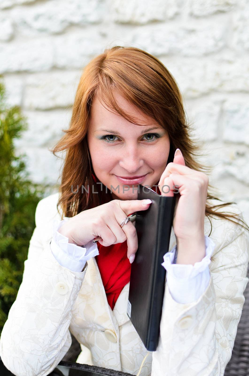 Portrait of pretty girl in street cafe