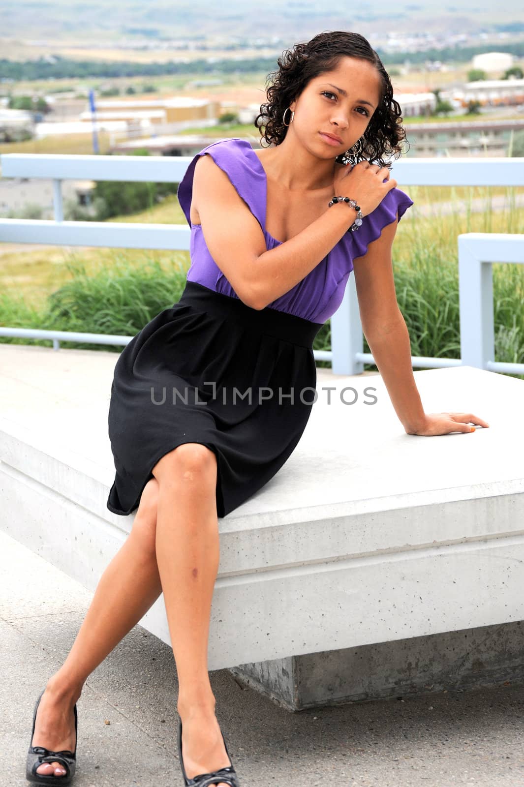 African american female beauty posing outside.