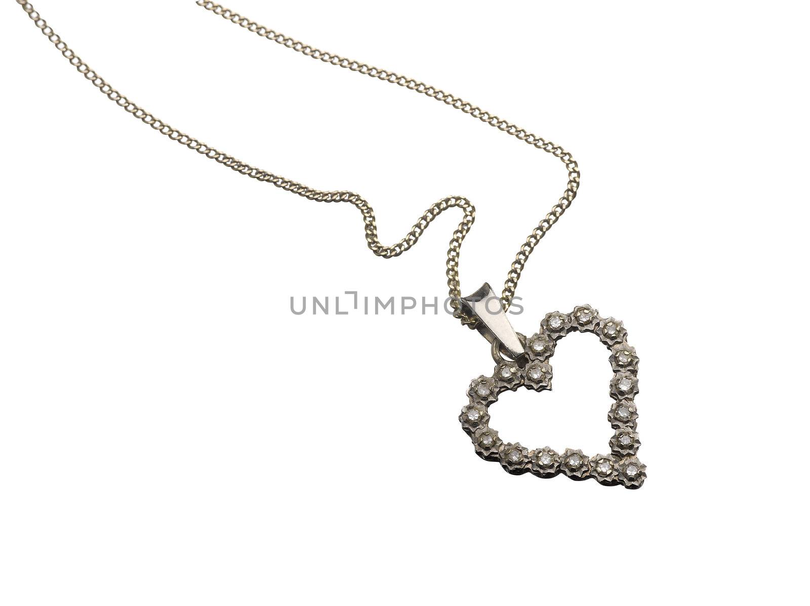 old heart pendant of silver, diamond  on white