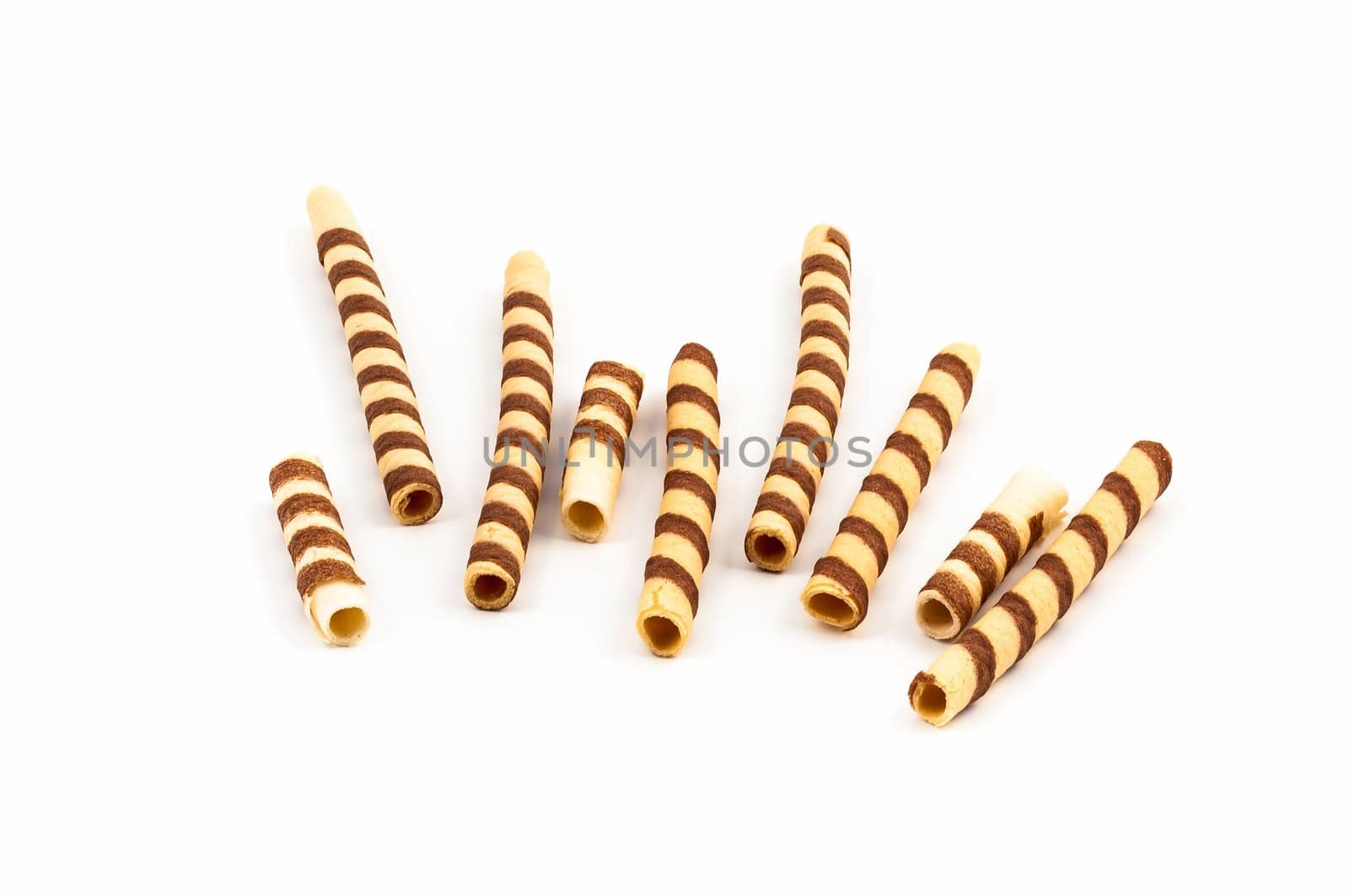 scattered crunchy wafer stick for ice-cream decoration isolated on white background