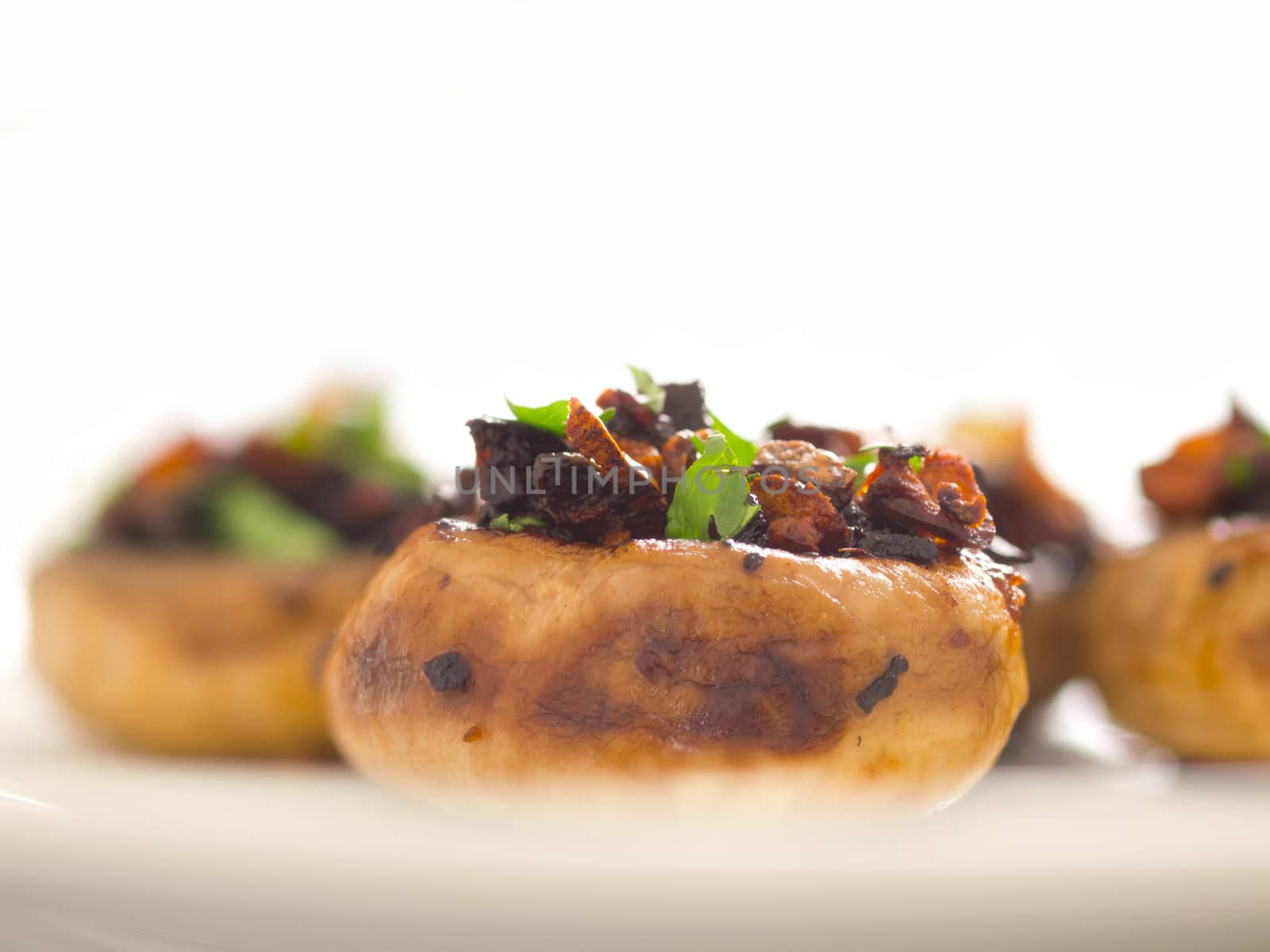 close up of freshly sauteed button mushrooms