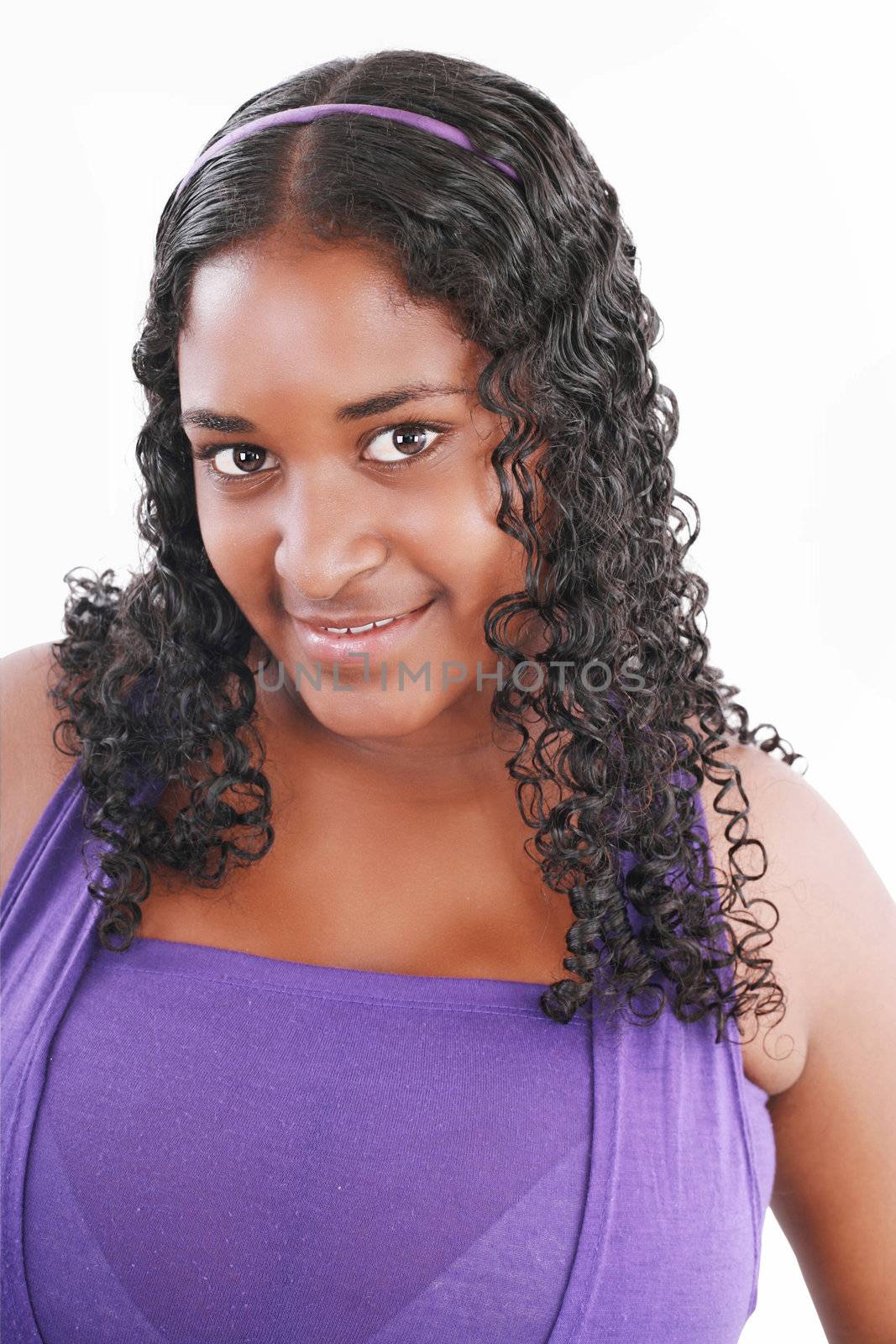 Face of a beautiful African Caribbean teenager girl, isolated. by dacasdo