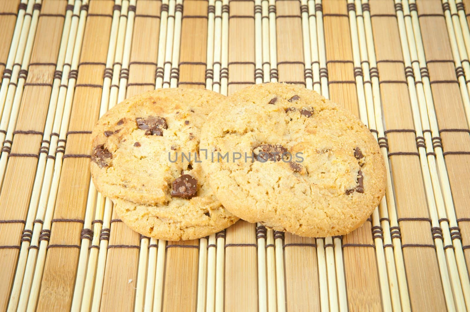 Chocolate chip cookies on wood background