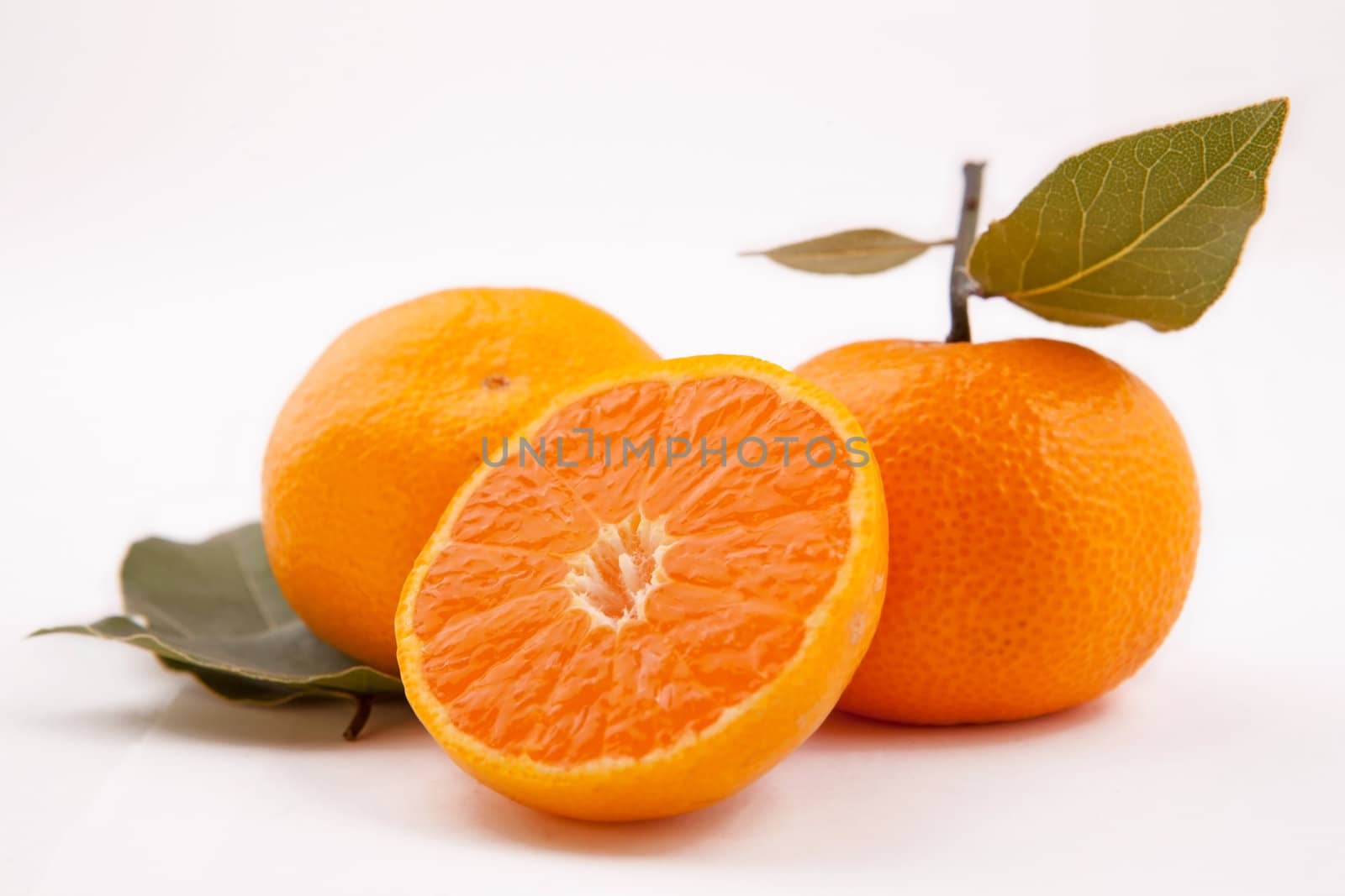 Fresh tangerine on isolated fone