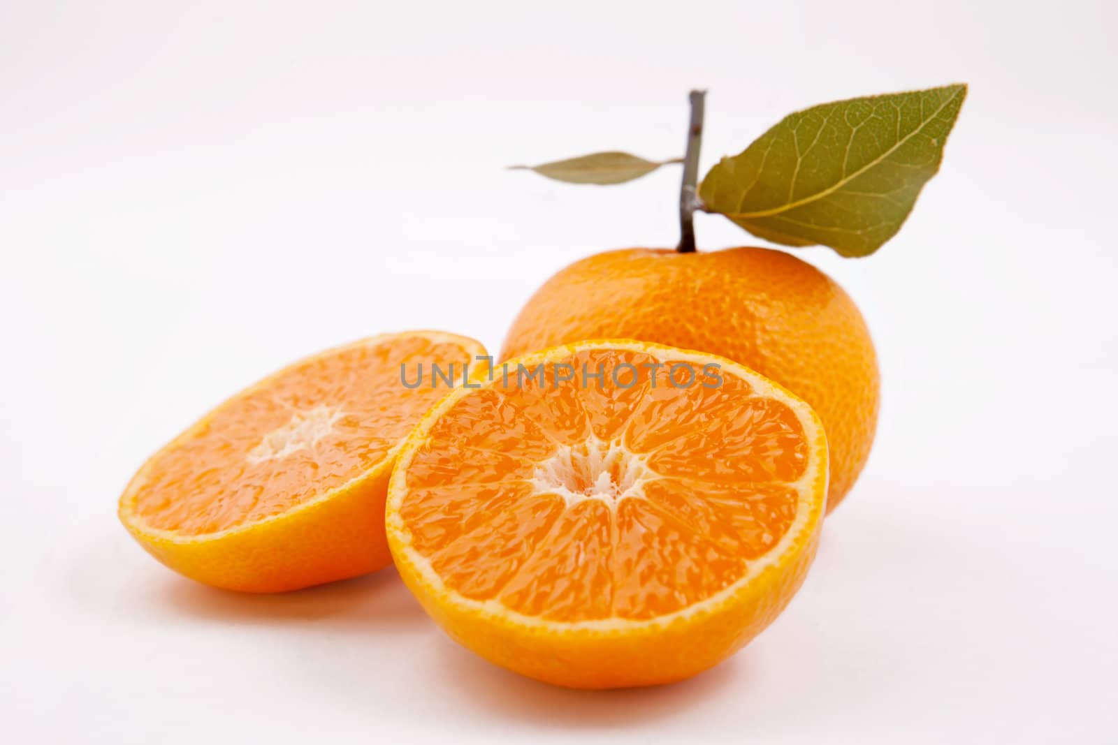 Fresh cutted tangerine on isolated fone