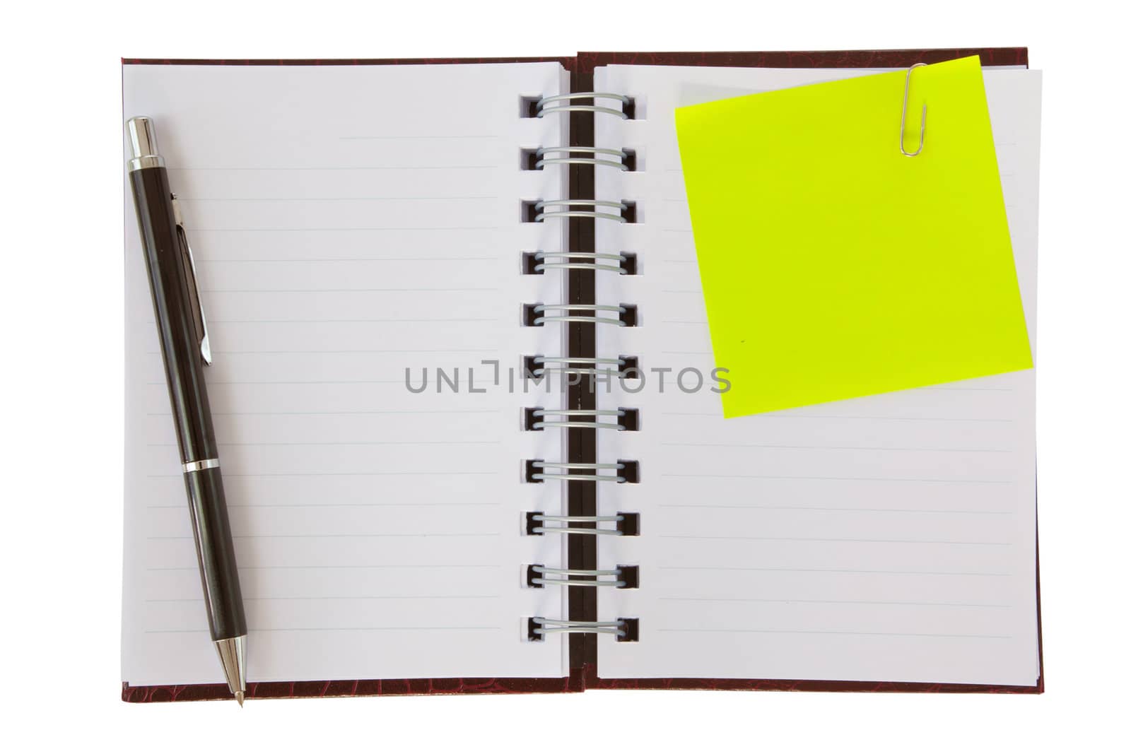 Notebook with and pen isolated on white background
