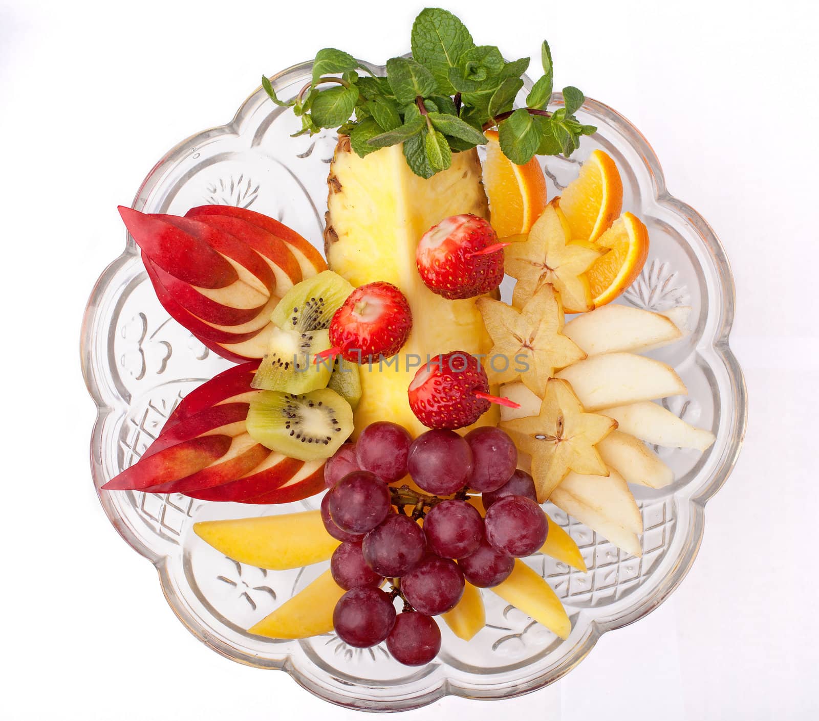 Dish with fresh fruits and berries