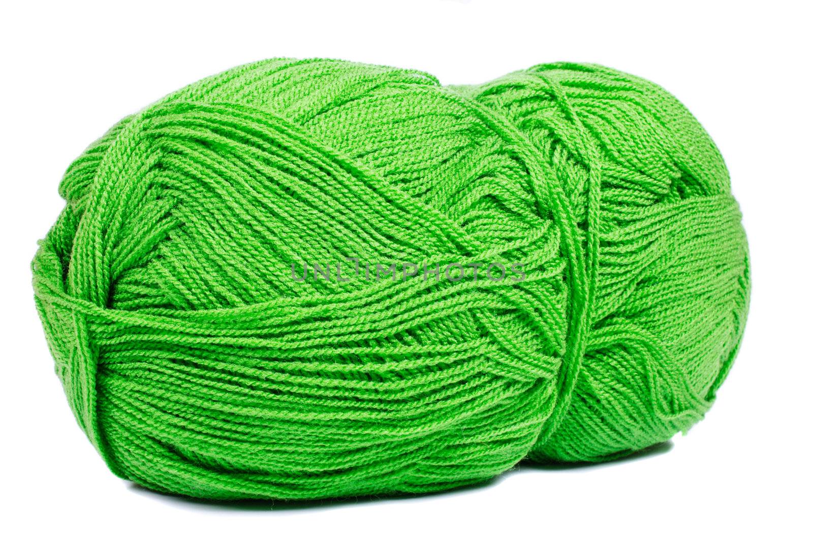 Green thread ball for knitting isolated