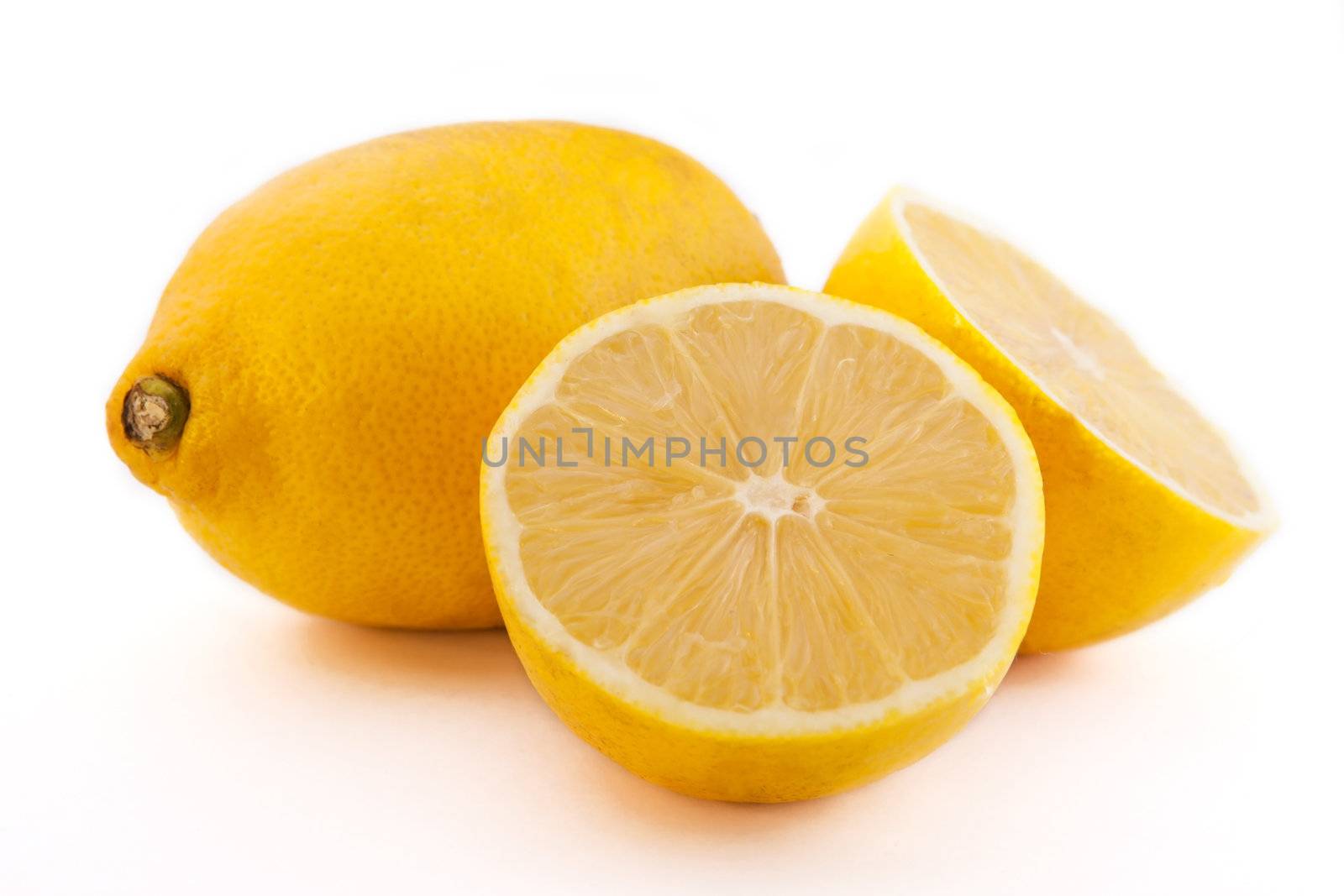Fresh ripe lemon on white fone 