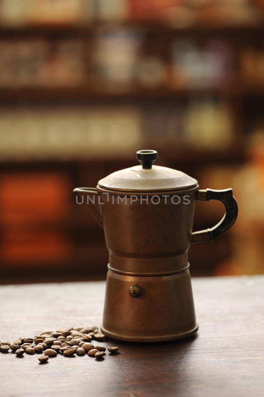 old coffee maker on wooden table