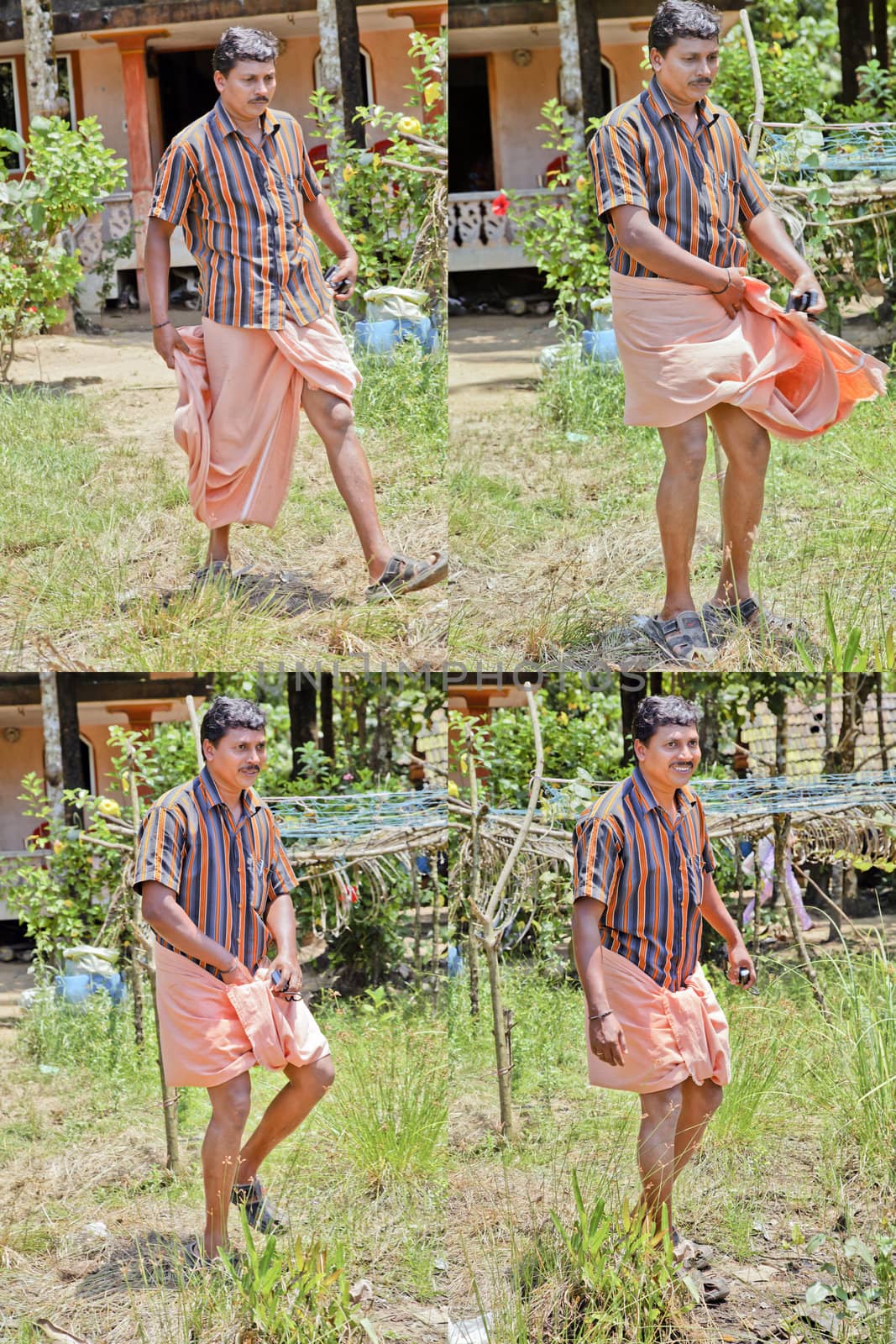 Kerala man demonstrate how to tie a long lunghi into a short one used when getting into the backwaters to pull in a boat