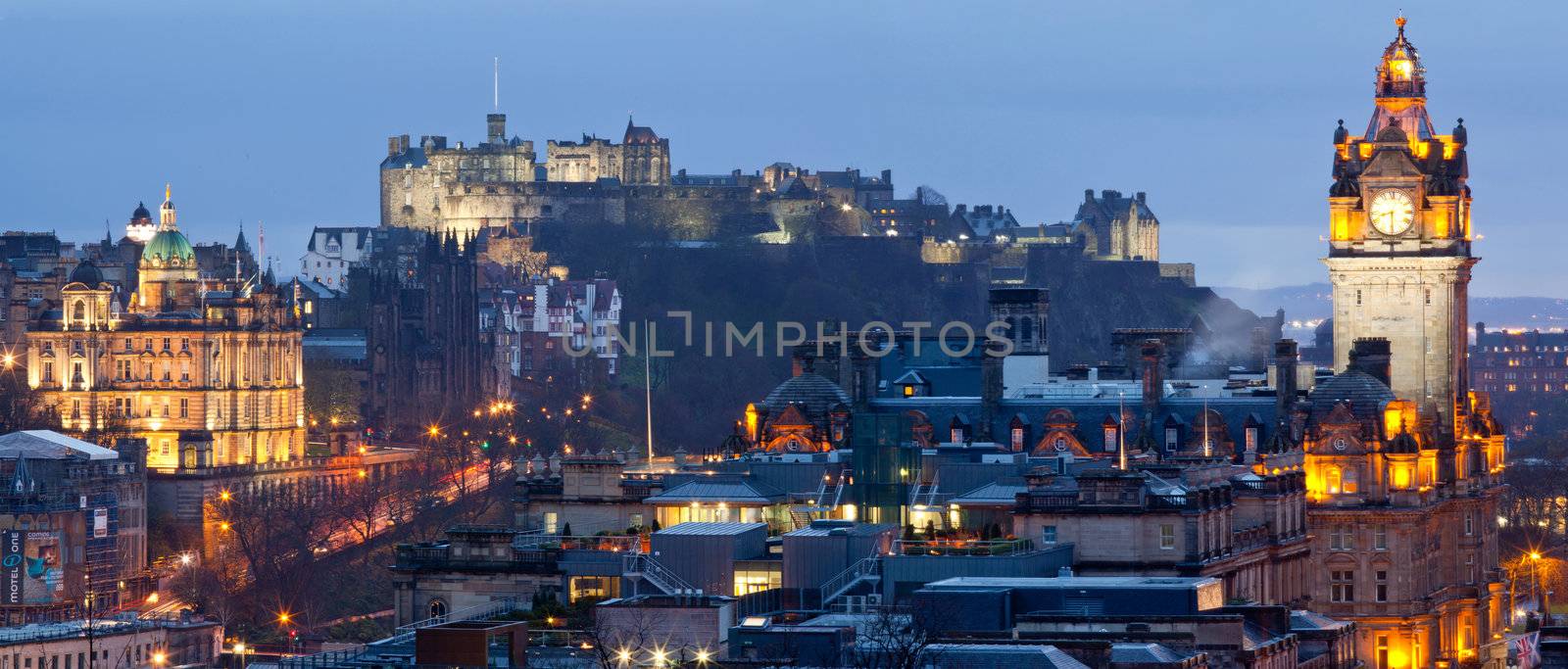 Panorama of Edinburgh Cityscape and castle from Calton Hill at dusk Scotland UK