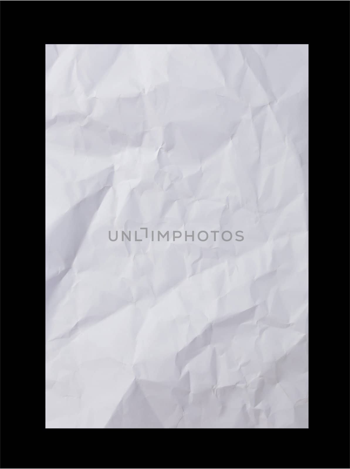 Crumpled paper on black background