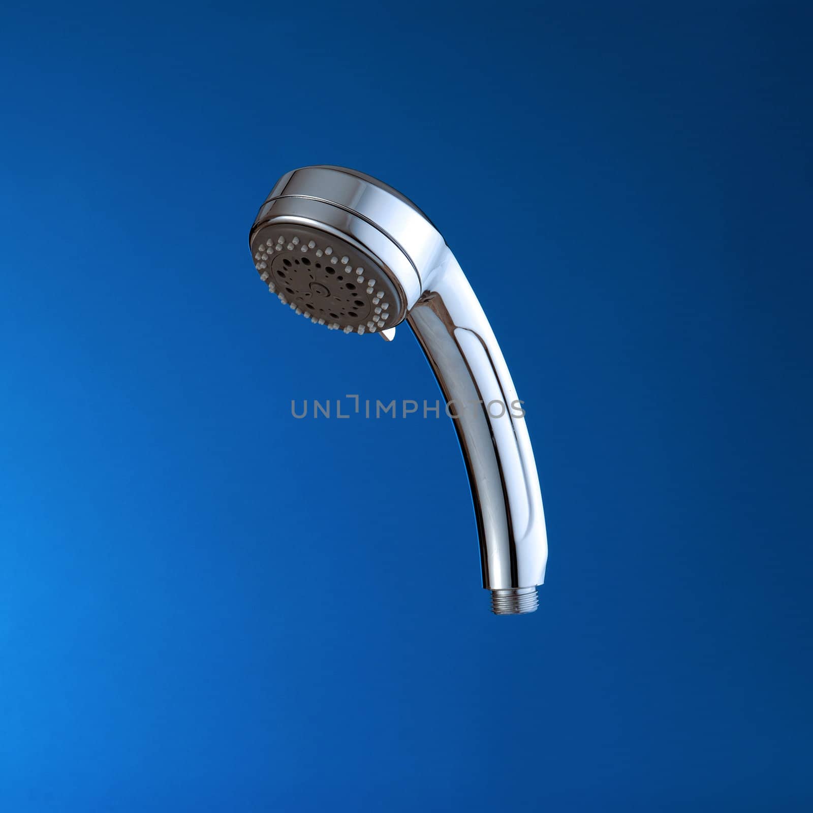 Shower head close-up, on blue background