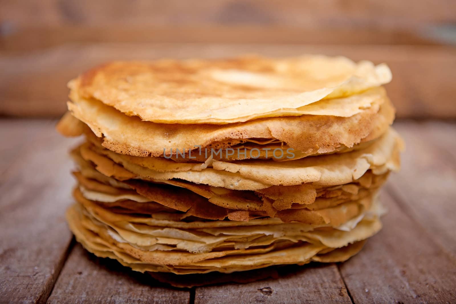 Crepes on the wooden table