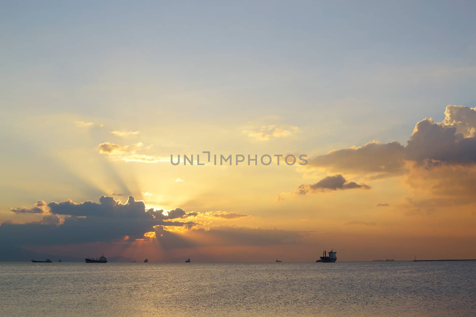 dramatic sunbeam before the sunset at manila bay.