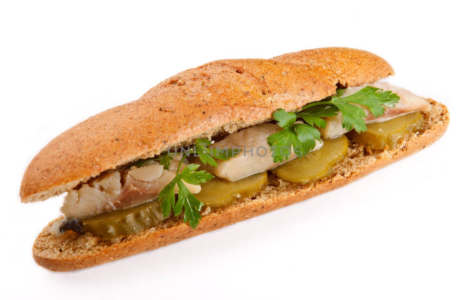 Sandwich with herring, parsley and pickles