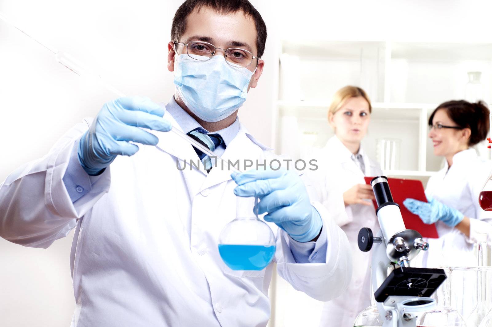 chemist working in the laboratory by adam121