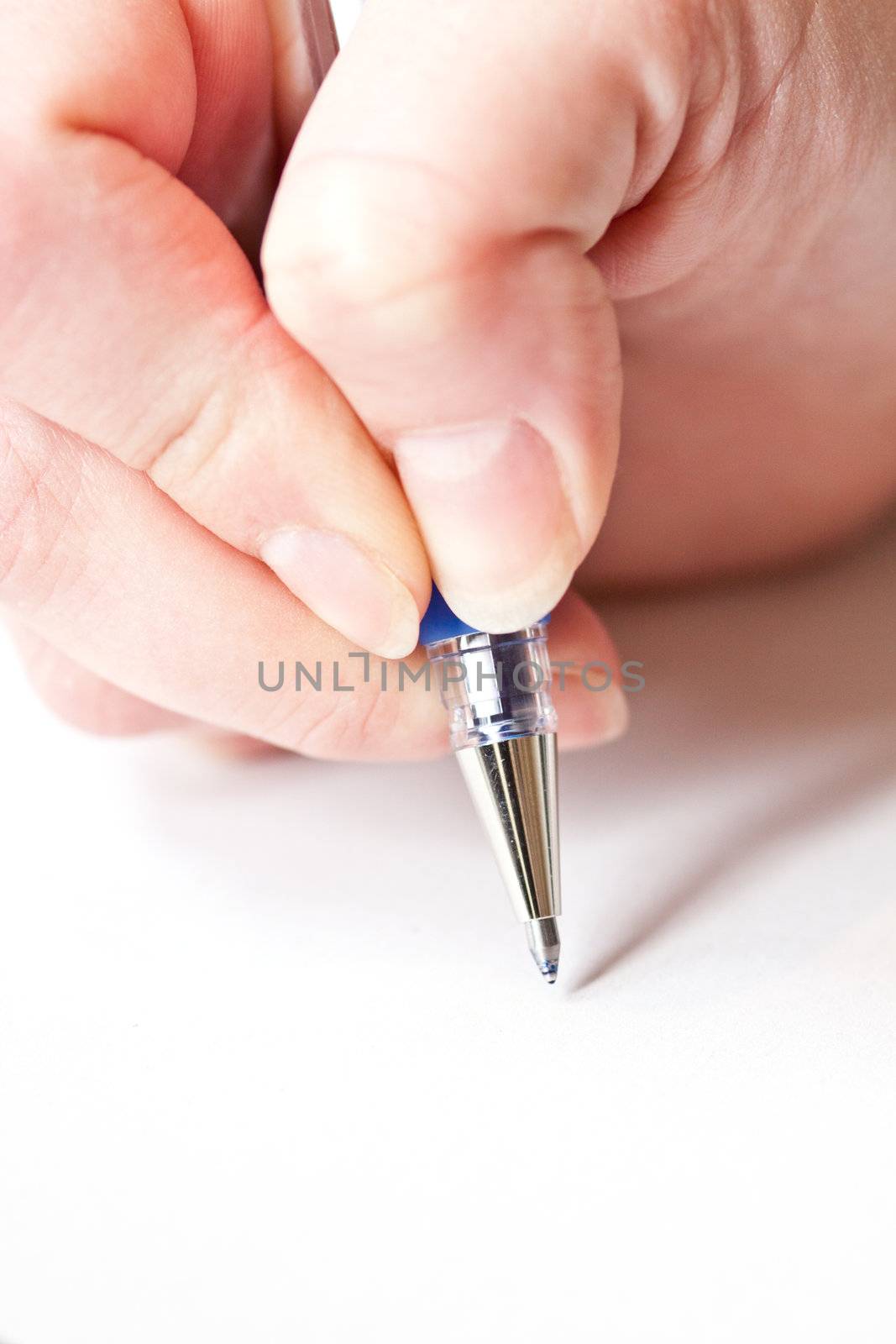 womans hand is writing a letter with a pen  by juniart