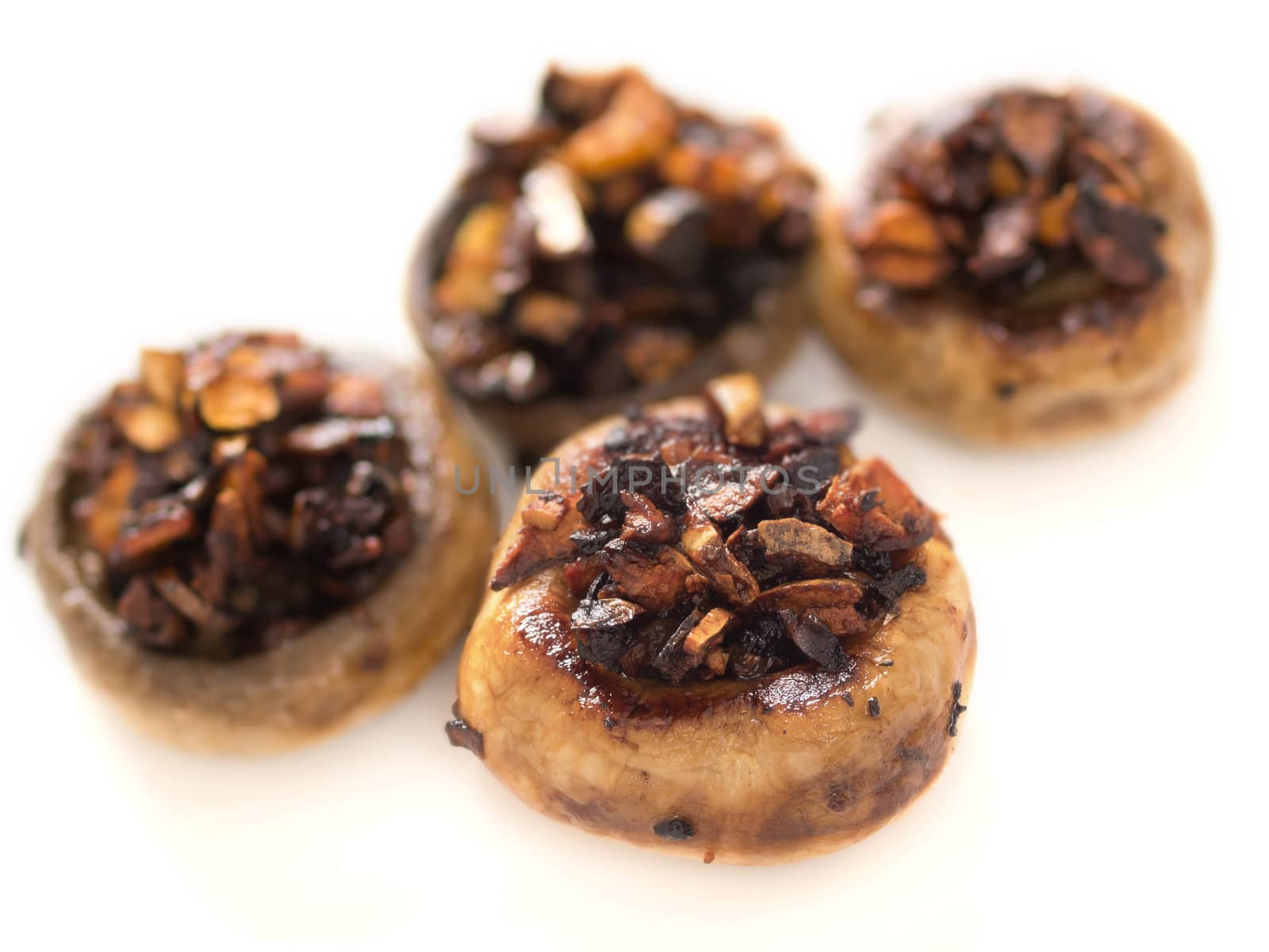 close up of freshly sauteed button mushrooms 