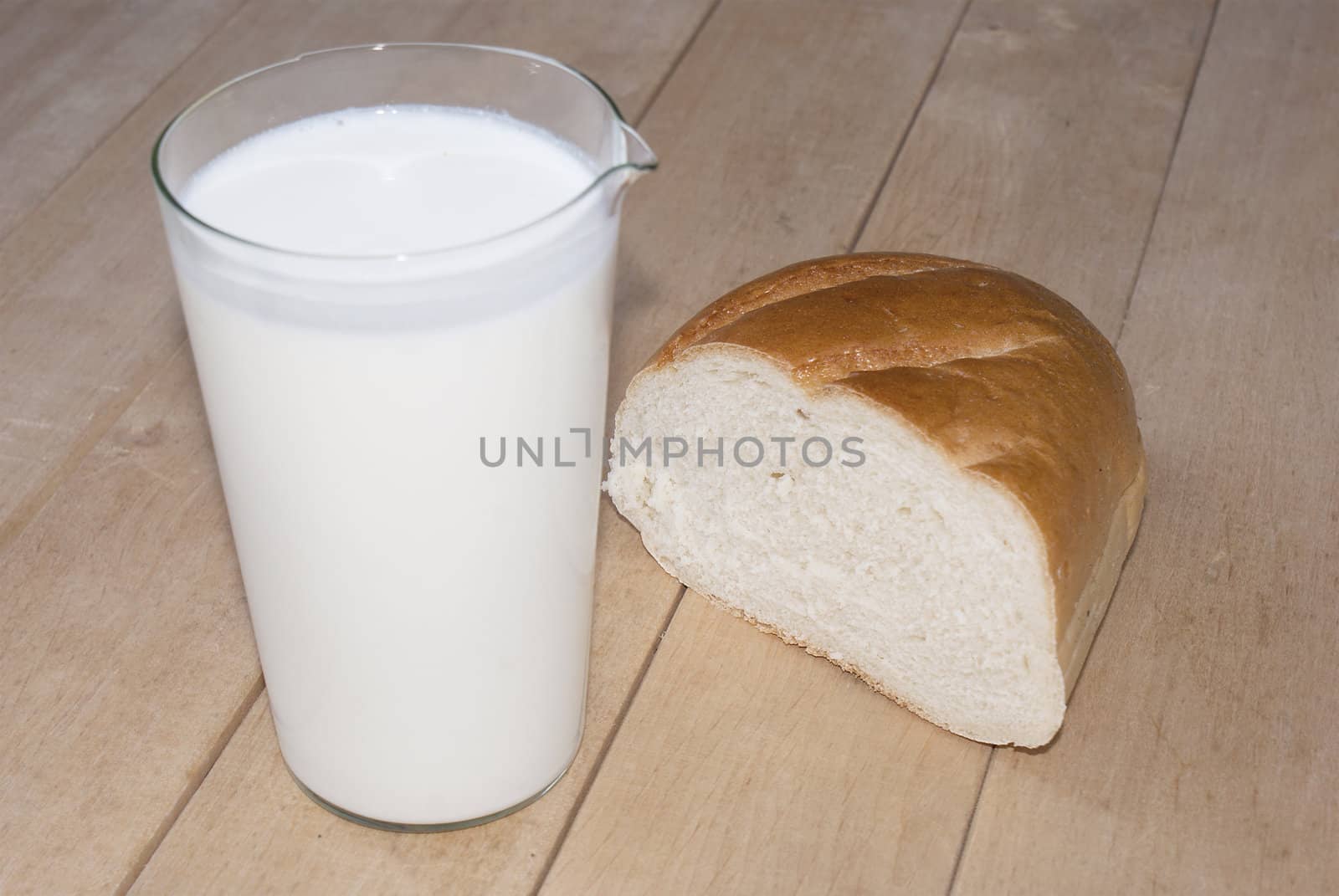 Glass fresh milk and bread by sergey150770SV