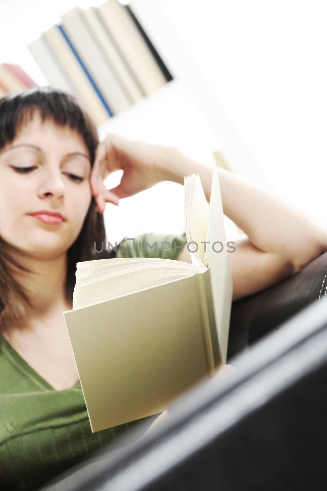 portrait of a  young woman woman with book 