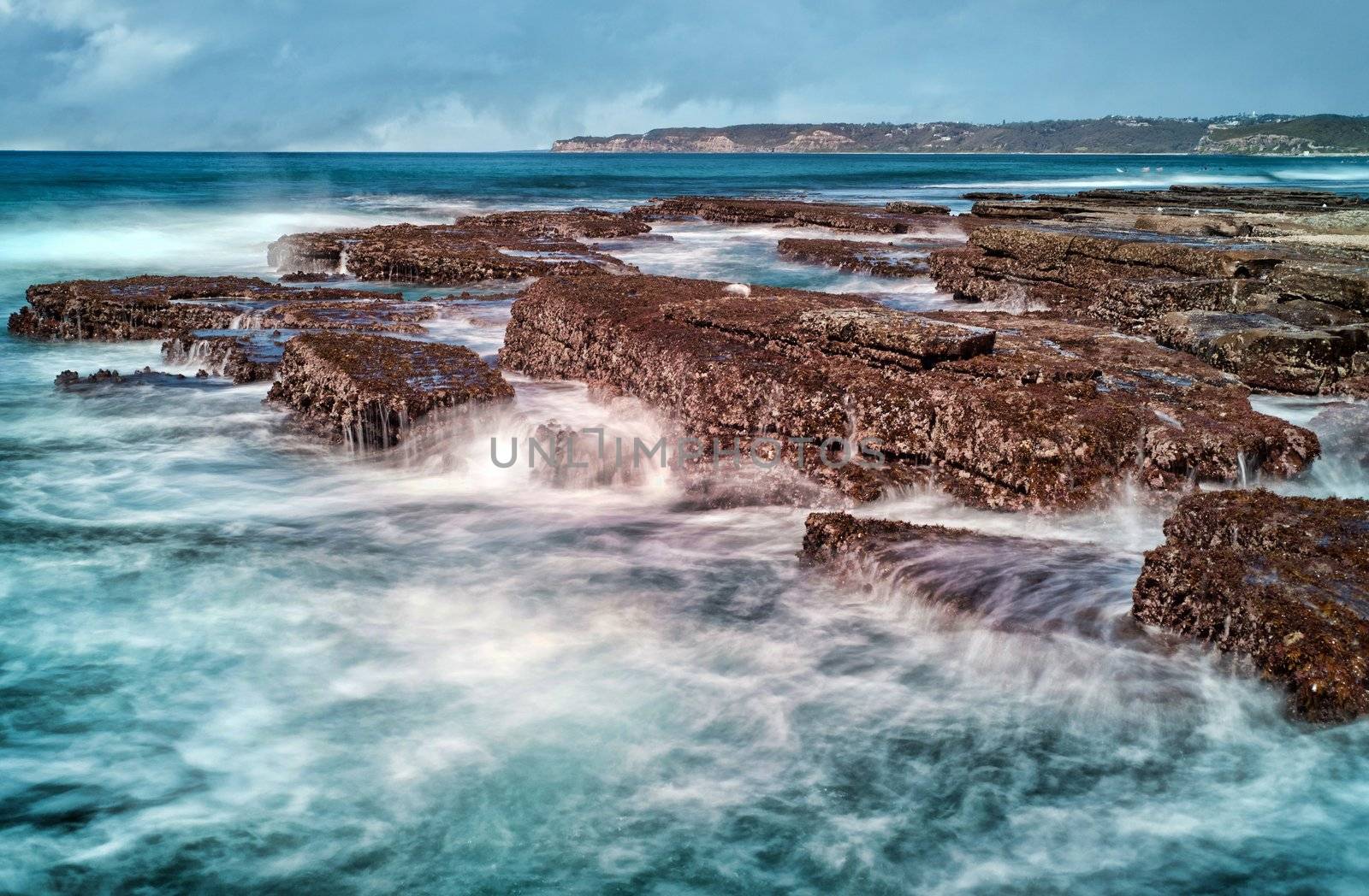 waves on rocks at the coast by clearviewstock