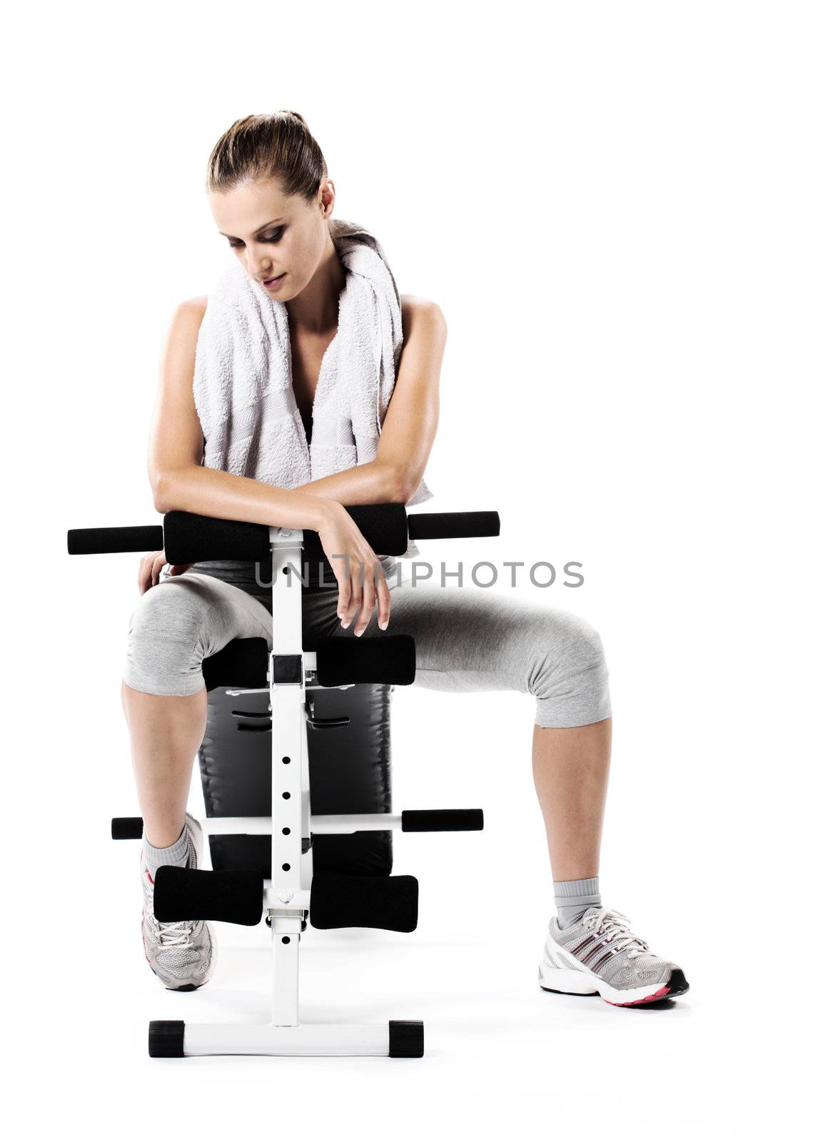 Young woman resting after exercising 