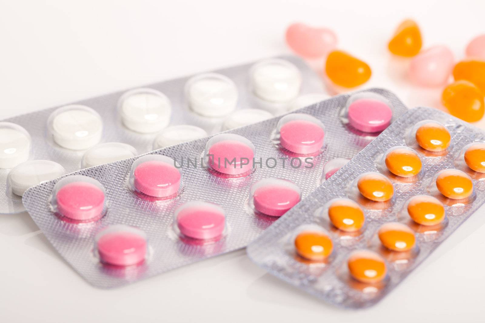 pills on white background. by motorolka