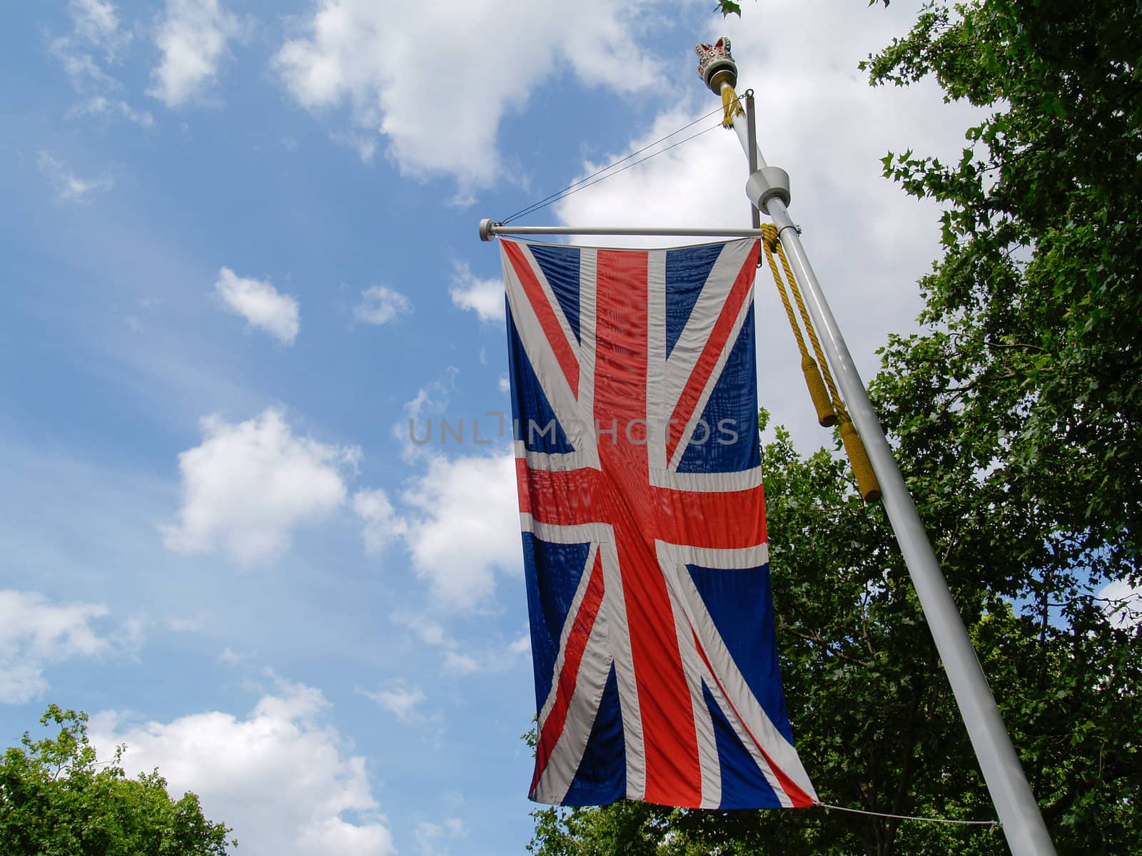 Union Jack Flag hangs from pole on London's Mall.