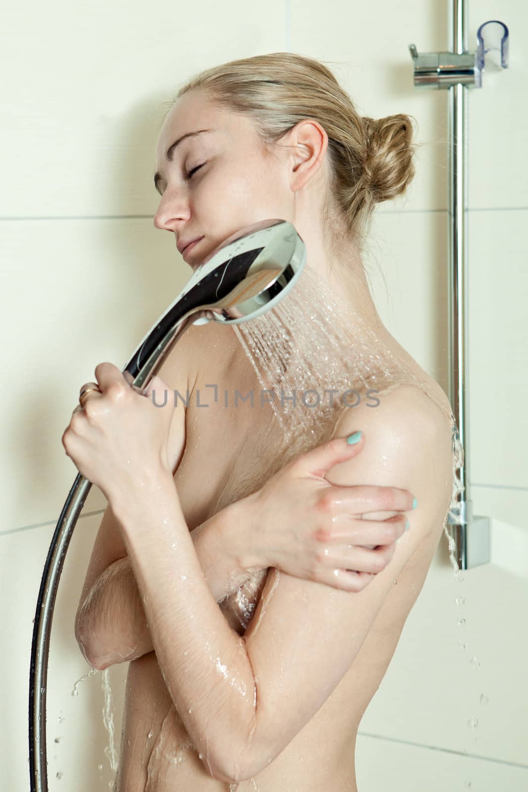 woman is taking a shower and relaxing by juniart