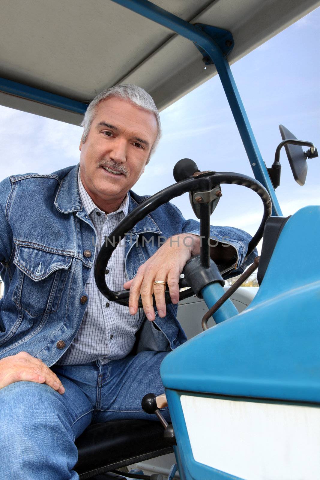 Man driving a tractor