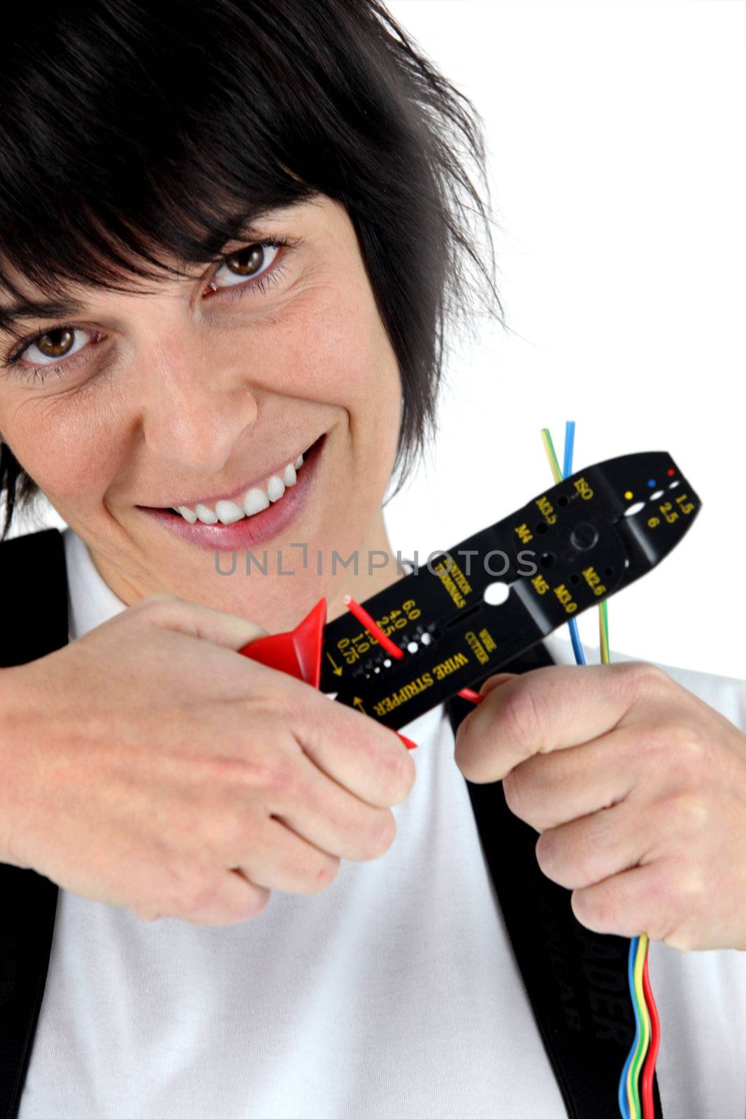Woman with a wire stripper
