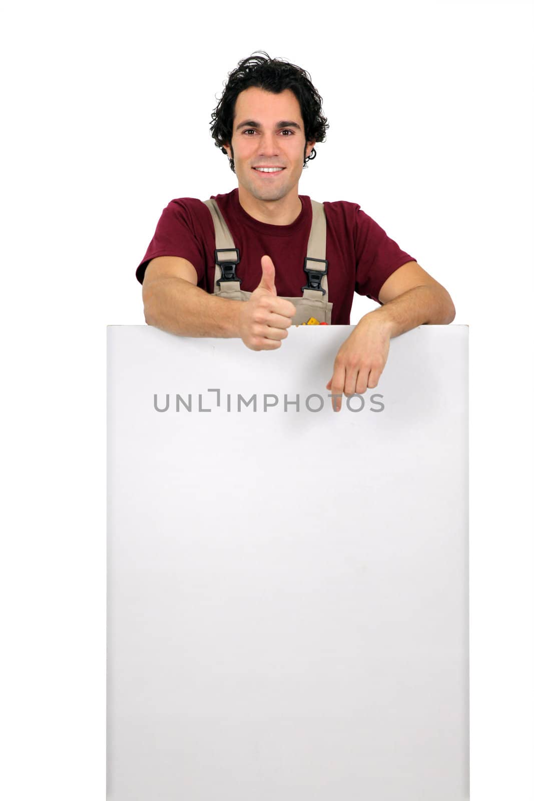 Worker pointing white plate