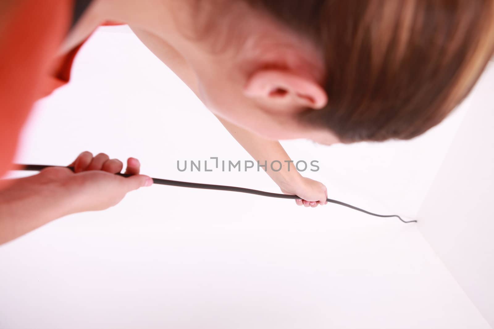 Woman holding a wire by phovoir