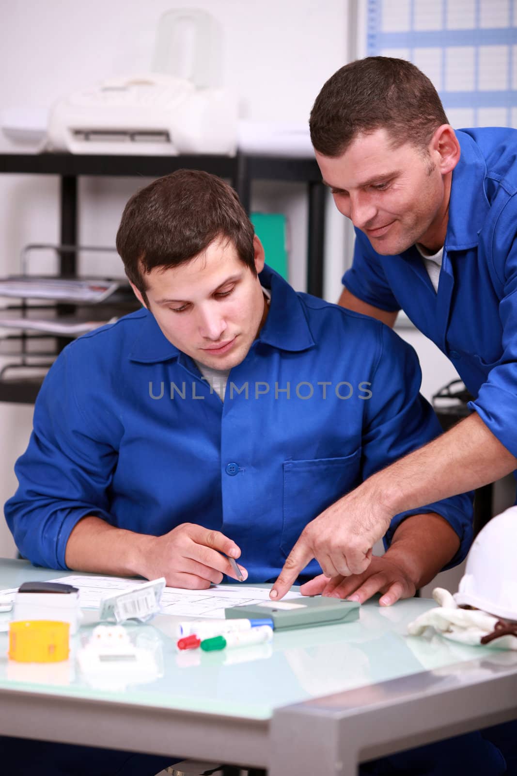 Two laborers in office