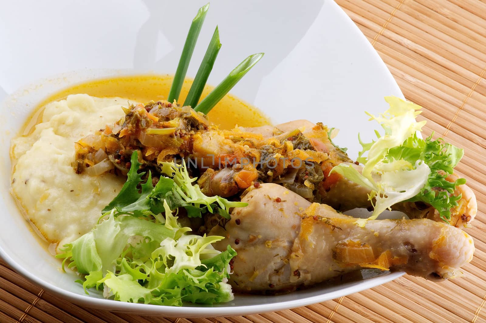 Roasted chicken legs with mashed potatoes, vegetables saute and greens by zhekos