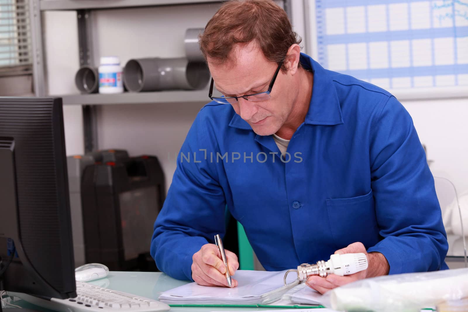 Builder working in the office