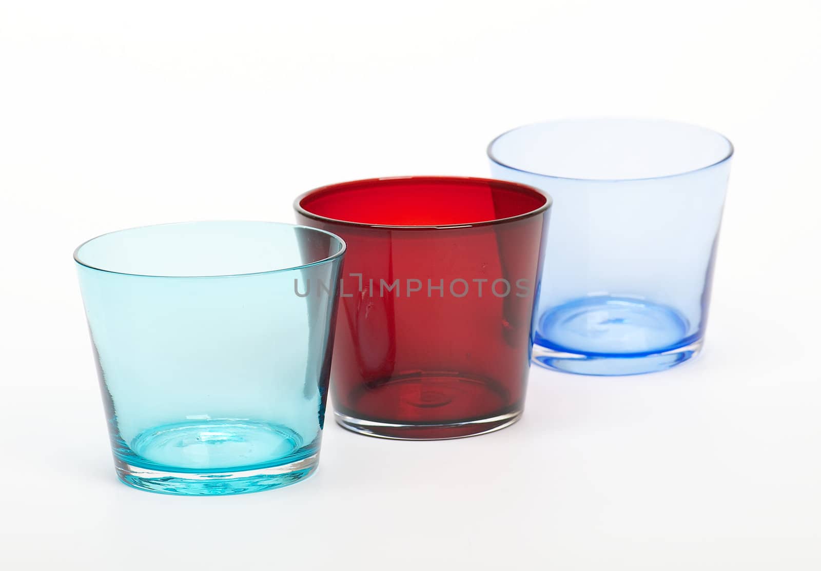 Three color glasses isolated on white background