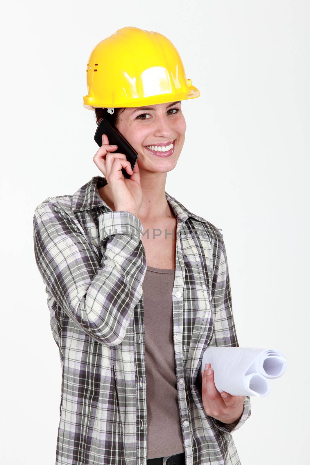 Female mason with plans