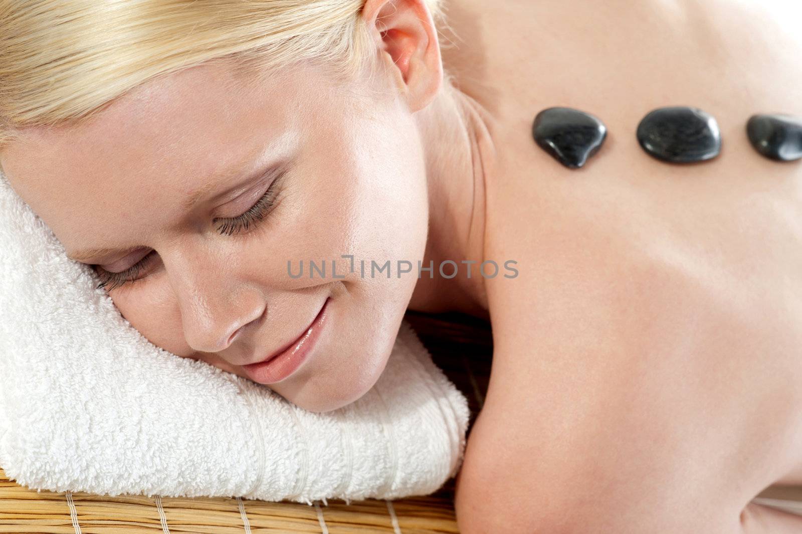 Portrait of a beautiful spa girl relaxing by stockyimages