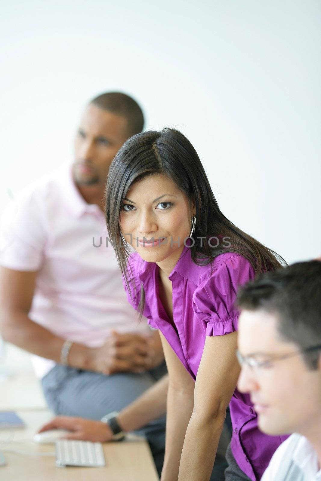 Woman participating in a seminar by phovoir