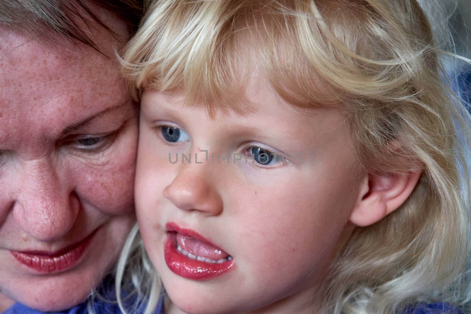 Portrait of a happy grandmother and her grandaughter having quality family time together                              